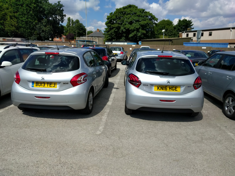 Not pictured: the other two silver Peugeot 208s parked one row over